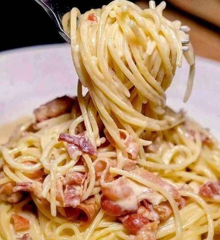 "Carbonara Perfetta: Il Segreto Romano per un Piacere Cremoso Senza Panna"