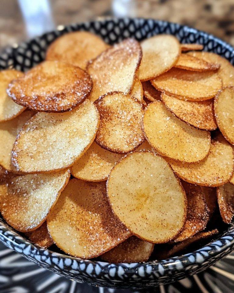 Fette di mela con zucchero e cannella per la friggitrice ad aria